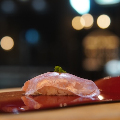 Chef Yohei preparing sushi