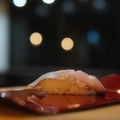 Chef Yohei preparing sushi